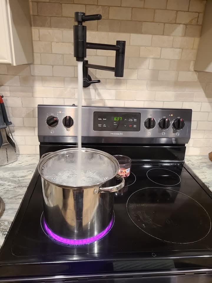 Pot filler, in use