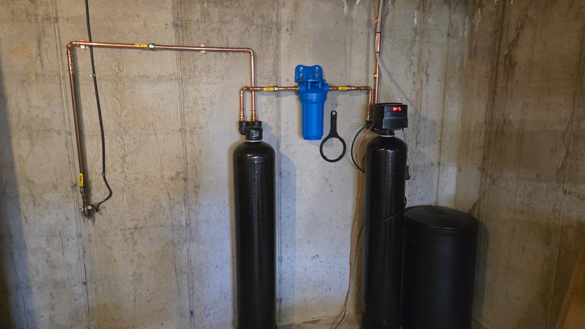 Whole-house water softener and filtration system
